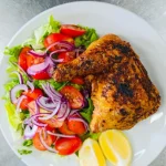 Pata y muslo al horno con guarnición a elección