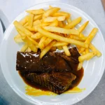 Tapa de asado tiernizada con guarnición a elección